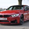BMW M3 F80 in Imola-Rot mit BMW M Performance-Zubehör BMW M3 F80 in Imola-Rot mit BMW M Performance-Zubehör