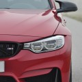 BMW M3 F80 in Imola-Rot mit BMW M Performance-Zubehör BMW M3 F80 in Imola-Rot mit BMW M Performance-Zubehör