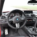 BMW M3 F80 in Imola-Rot mit BMW M Performance-Zubehör BMW M3 F80 in Imola-Rot mit BMW M Performance-Zubehör