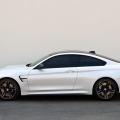 BMW M Performance Tuning am BMW M4 Coupé in Mineralweiss