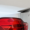BMW M Performance Tuning am BMW M4 Coupé in Mineralweiss